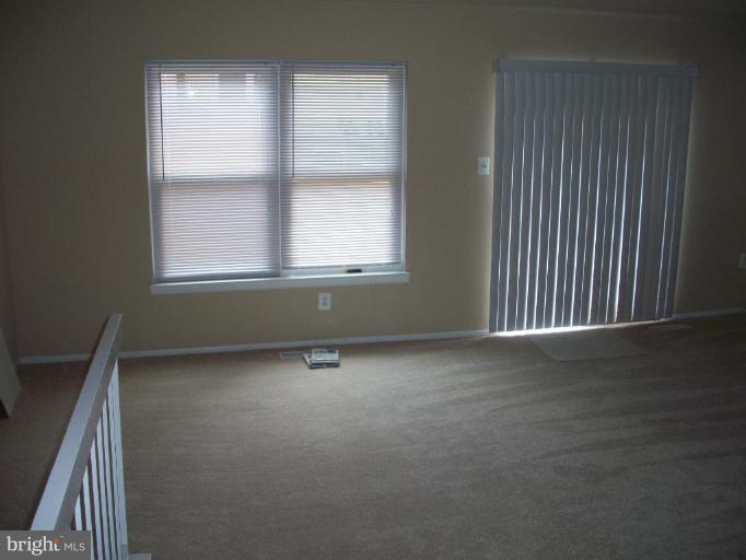 1 Pine Ridge Court Germantown, MD 20874 - Photo 8 of 10 Living Room/Dining Room