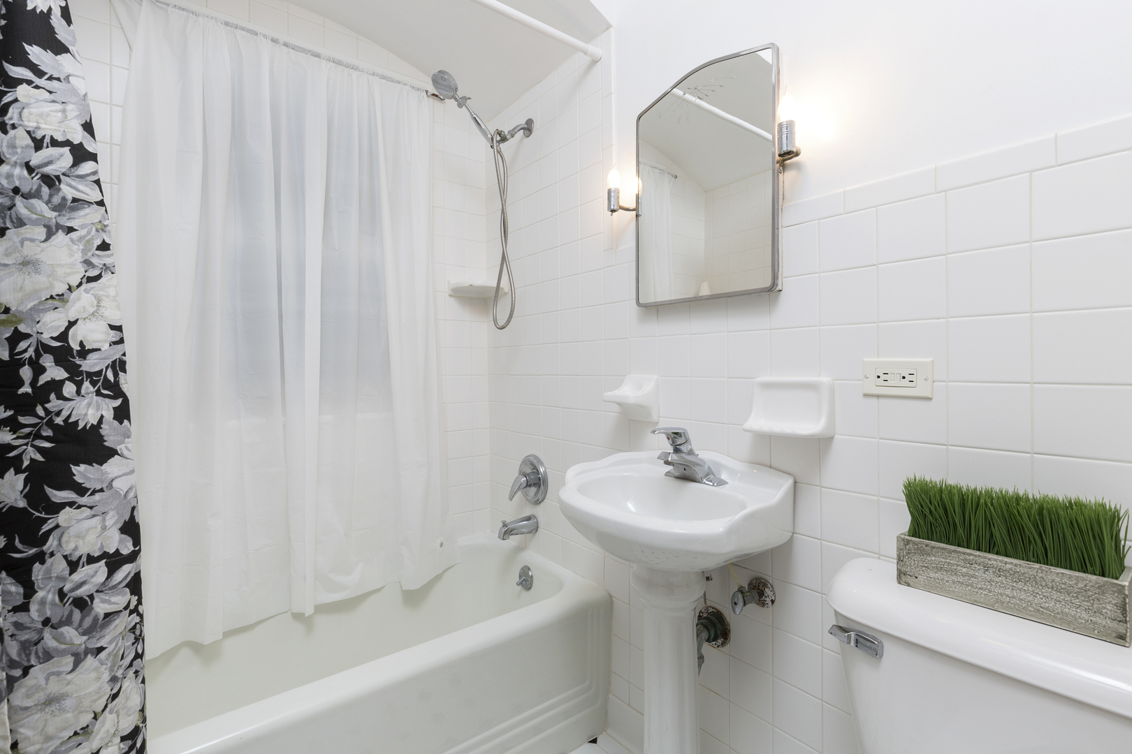 27 North Delaplaine Road Riverside, IL 60546 - Photo 14 of 32 a bathroom with a sink a mirror and a shower
