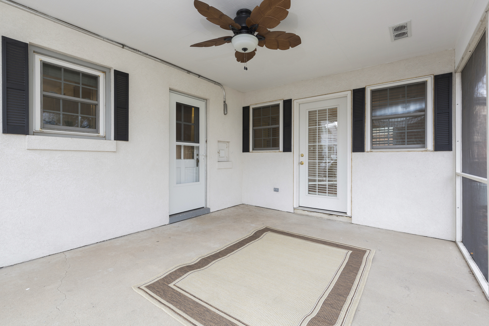 27 North Delaplaine Road Riverside, IL 60546 - Photo 18 of 32 a view of a livingroom with a ceiling fan and window