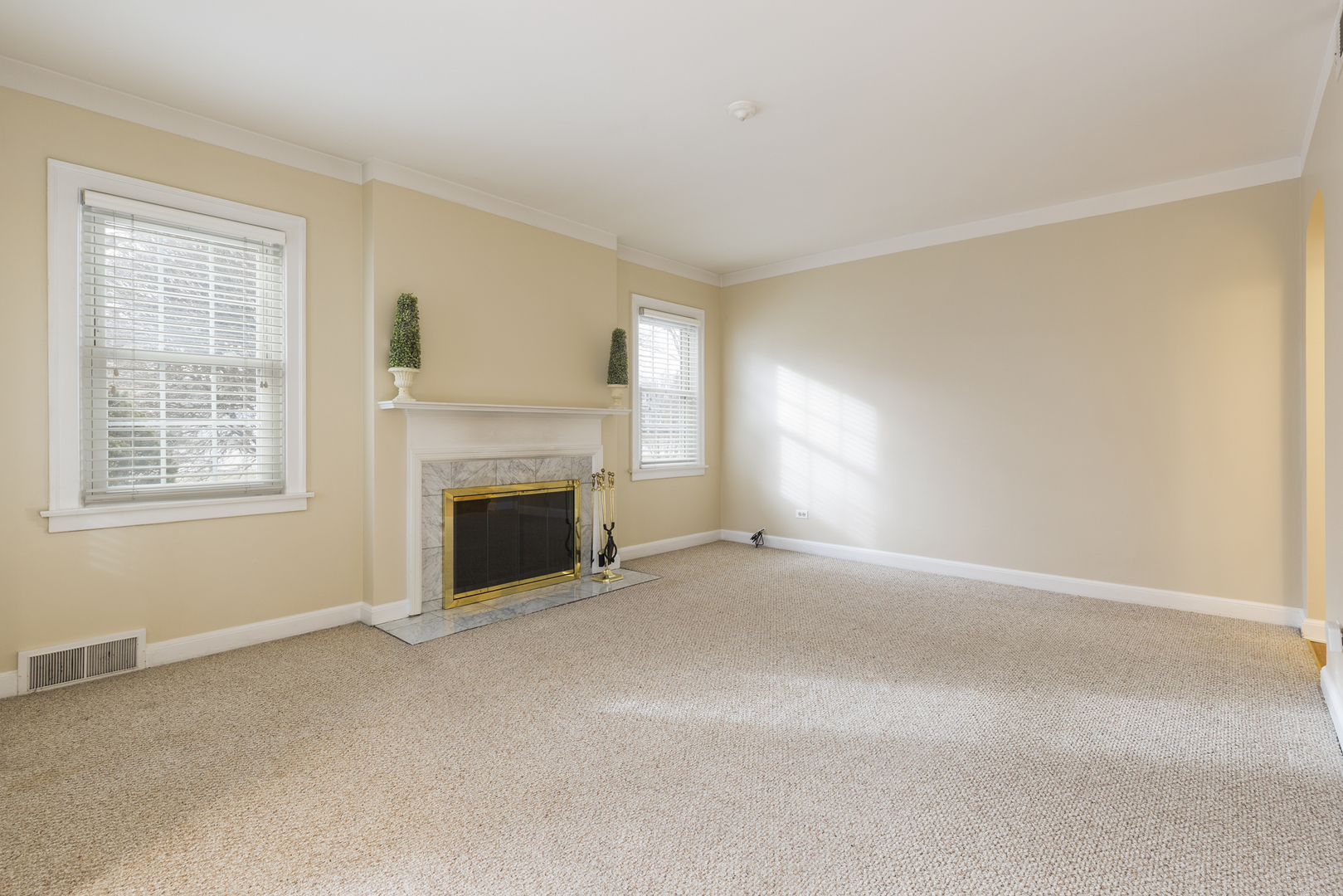27 North Delaplaine Road Riverside, IL 60546 - Photo 3 of 32 a view of empty room with a fireplace