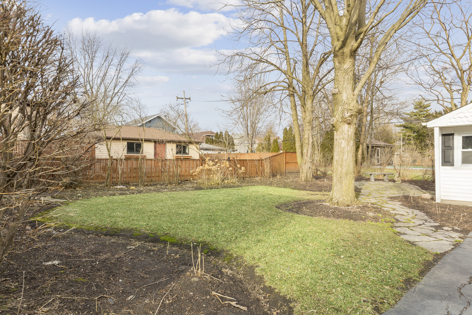 27 North Delaplaine Road Riverside, IL 60546 - Photo 21 of 32 a front view of a house with a yard
