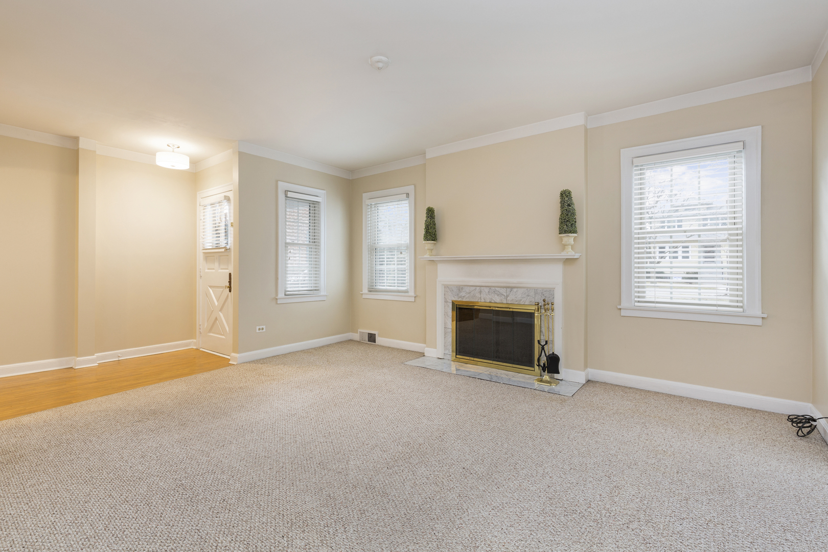 27 North Delaplaine Road Riverside, IL 60546 - Photo 4 of 32 a view of empty room with a fireplace