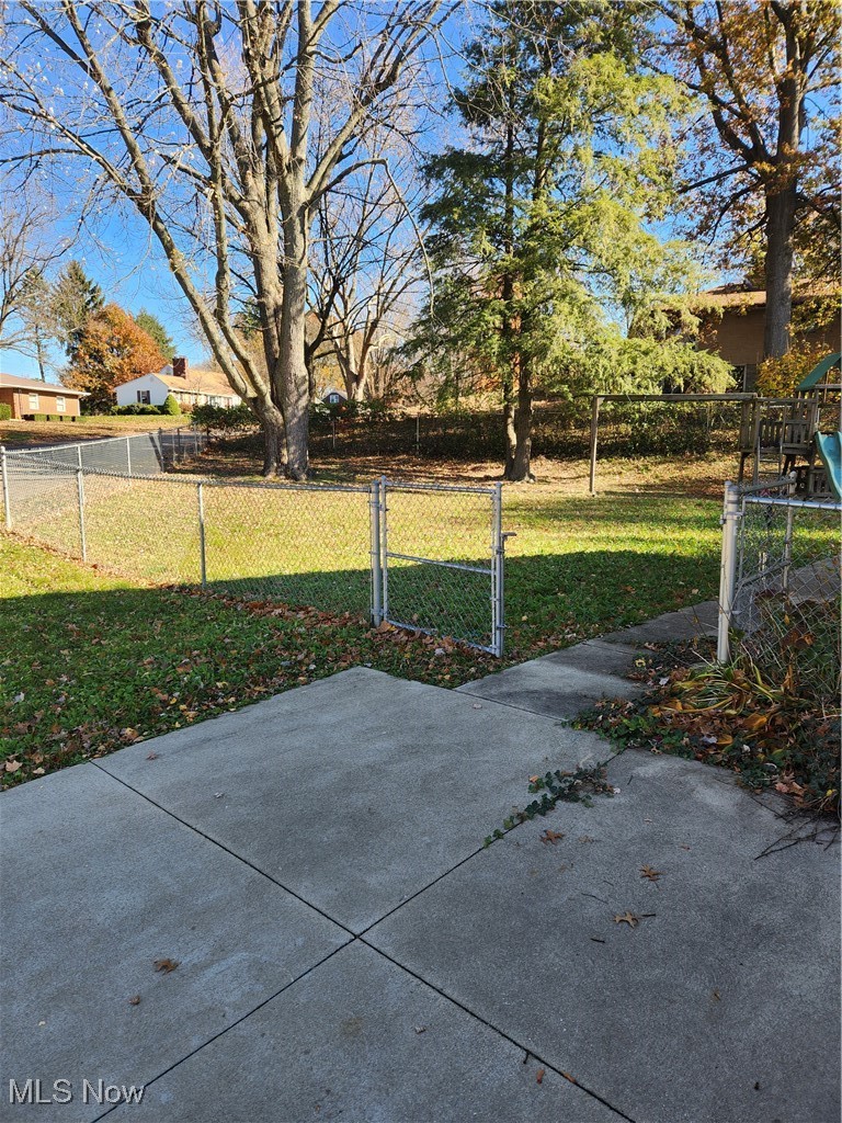 2440 Midvale Road Northwest Canton, OH 44708 - Photo 21 of 22 View of patio / terrace with a playground
