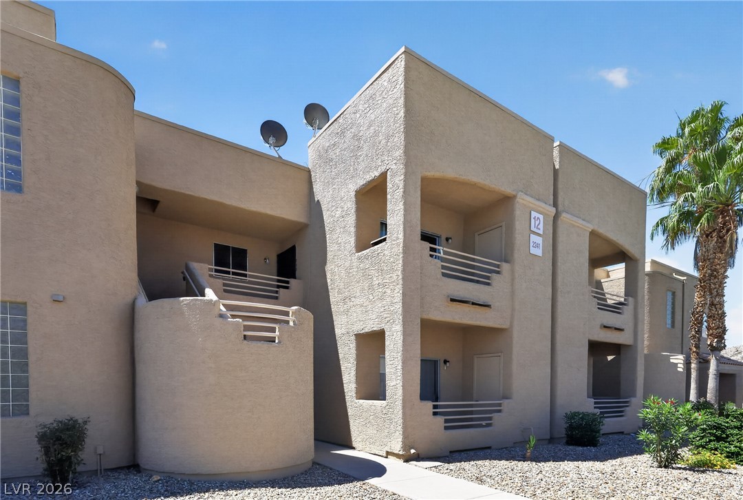 2241 Highpointe Drive, Unit 101 Laughlin, NV 89029 - Photo 1 of 23 This multi-level apartment complex boasts private balconies and desert-friendly landscaping, creating a serene environment.