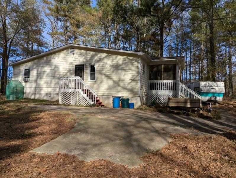 778 Poseyville Road Bremen, GA 30110 - Photo 4 of 27 a front view of a house with a yard