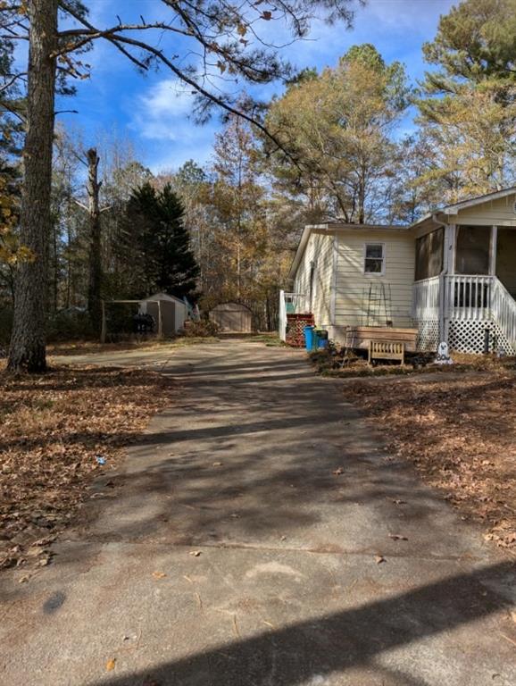 778 Poseyville Road Bremen, GA 30110 - Photo 6 of 27 a front view of a house with a yard