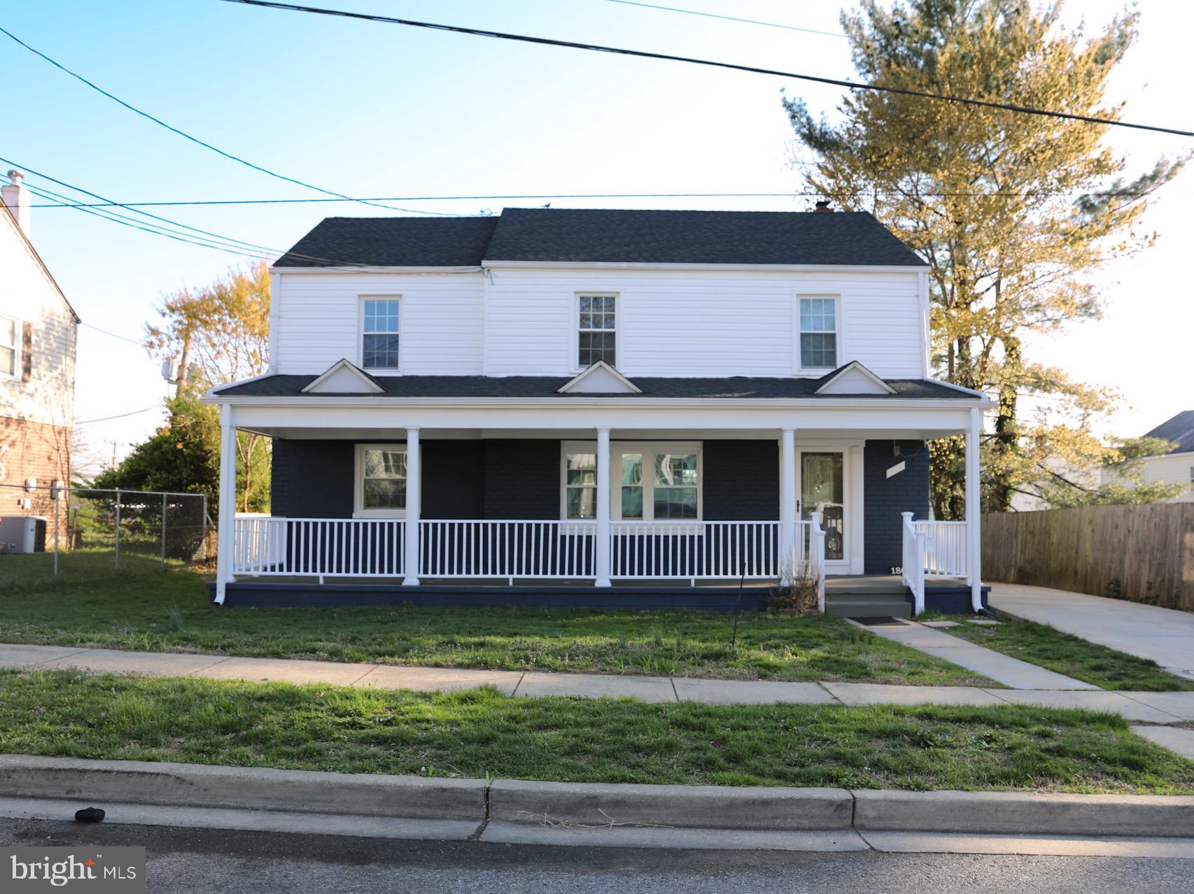 1803 Amherst Road Hyattsville, MD 20783 - Photo 1 of 17 a front view of a house with a garden