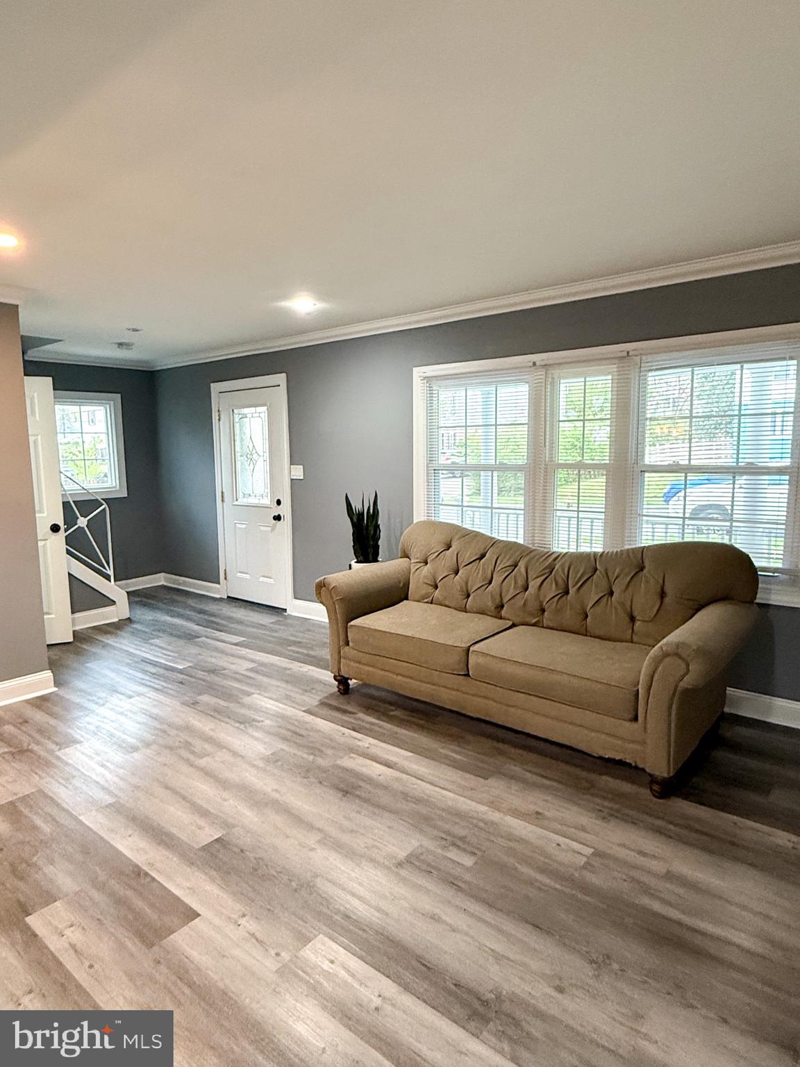 1803 Amherst Road Hyattsville, MD 20783 - Photo 4 of 17 a living room with furniture and a wooden floor
