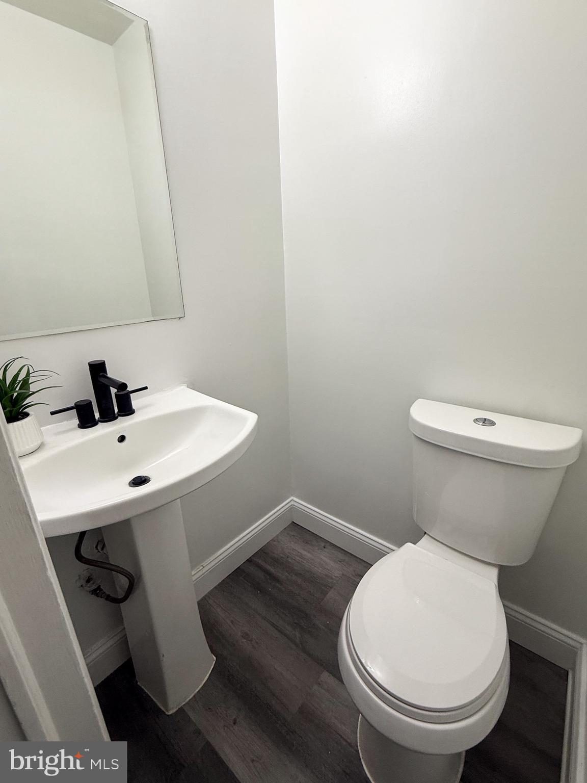 1803 Amherst Road Hyattsville, MD 20783 - Photo 6 of 17 a bathroom with a sink and a toilet