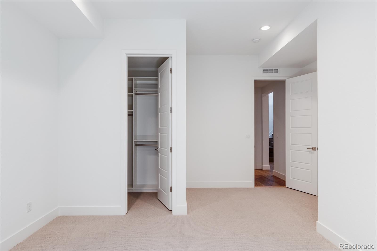 2250 Rim Ridge Drive Castle Pines, CO 80108 - Photo 33 of 38 an empty room with closet