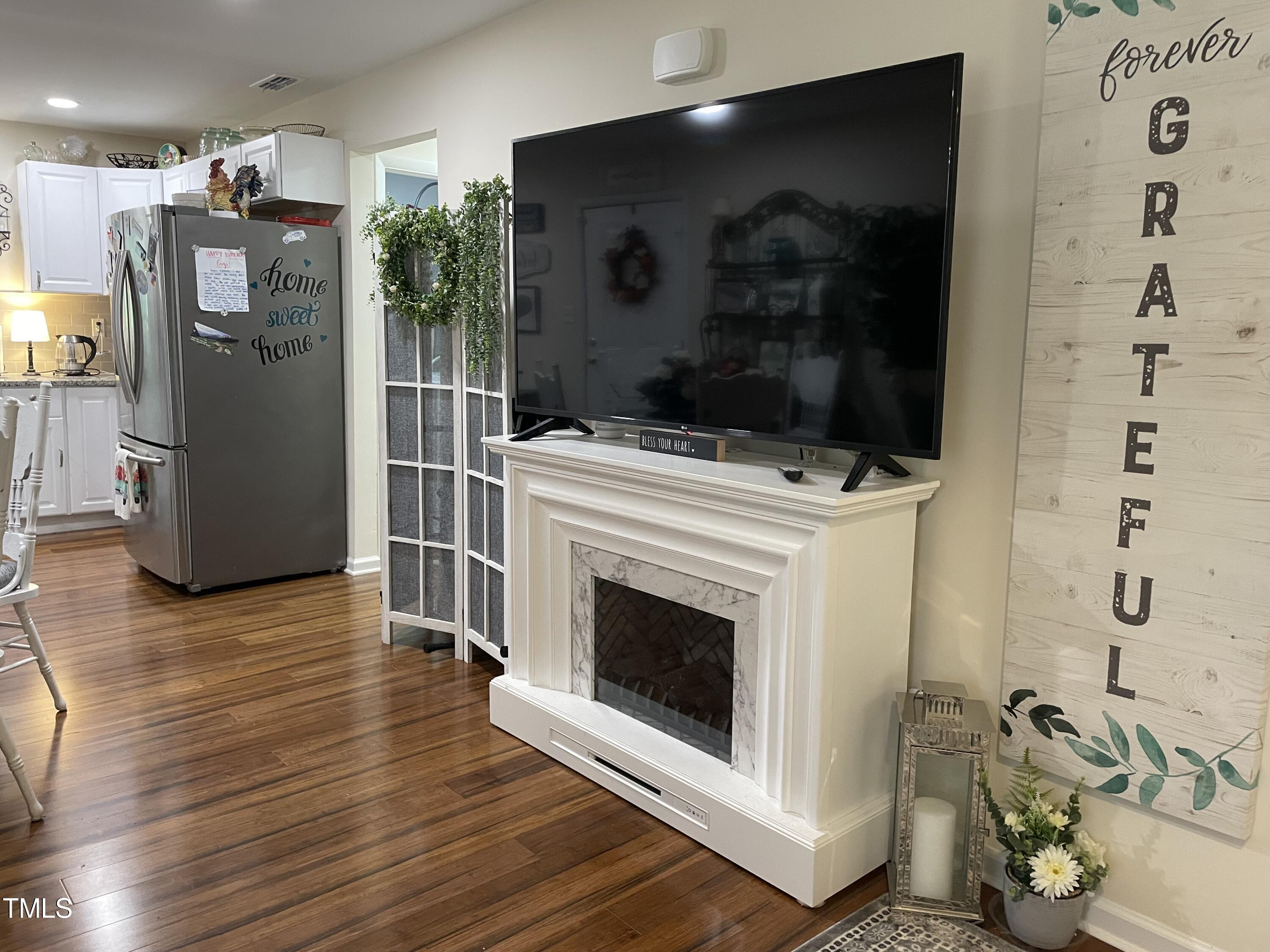 204 Jackson Street Dunn, NC 28334 - Photo 22 of 49 a view of a livingroom with furniture and a fireplace