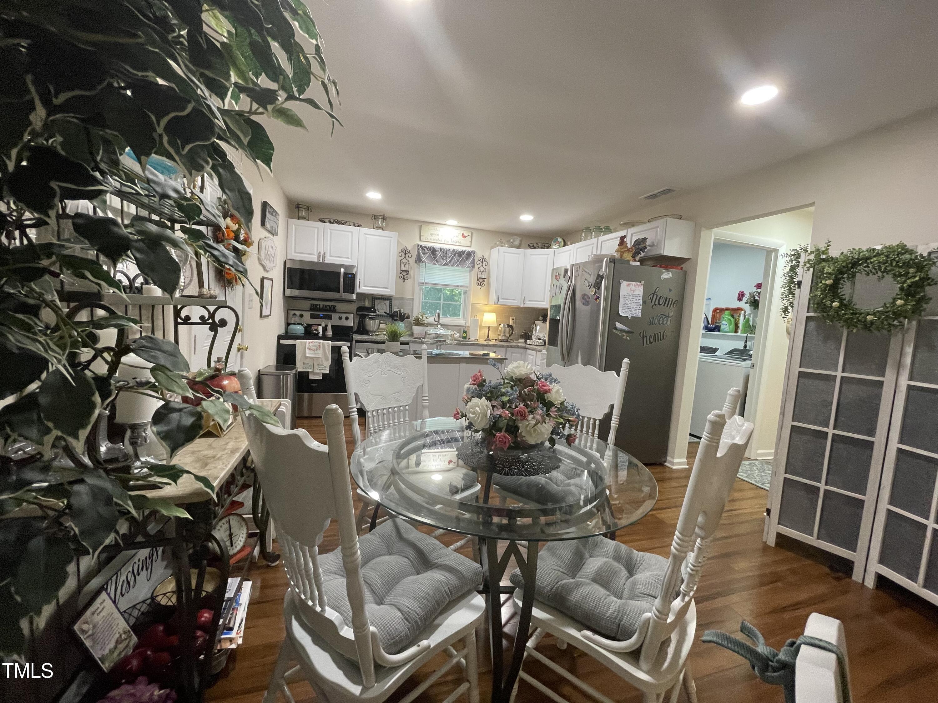 204 Jackson Street Dunn, NC 28334 - Photo 39 of 49 a view of a dining room with furniture