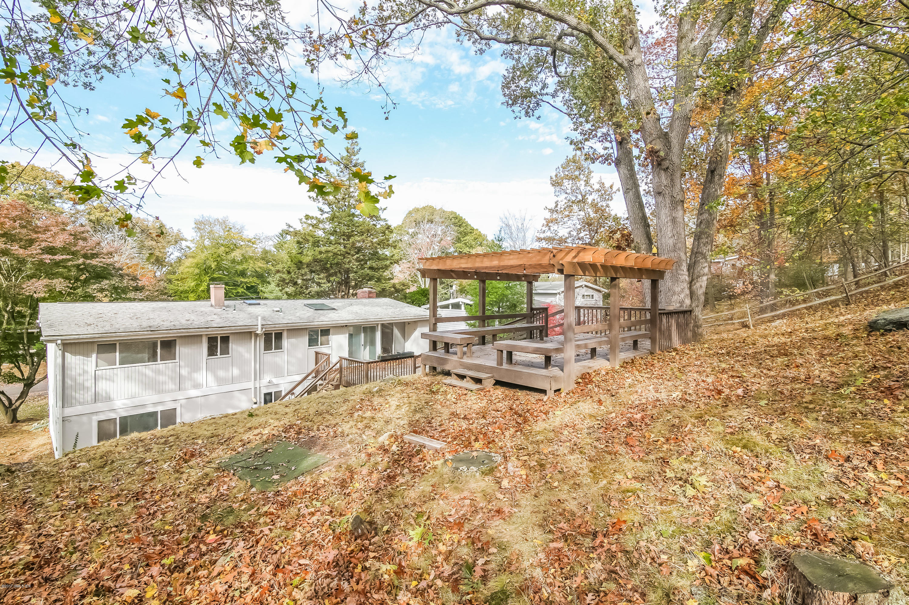 46 Crawford Terrace Riverside, CT 06878 - Photo 15 of 17 a view of a house with backyard and sitting area