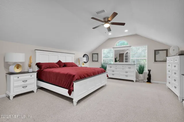 a view of a patio with couches chairs and a potted plant