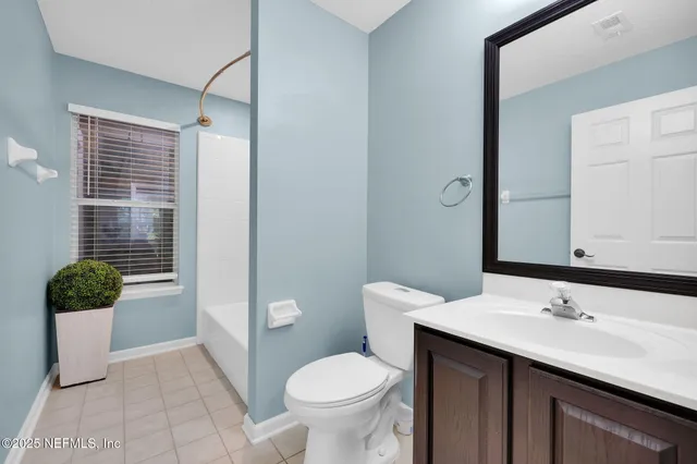 a view of a yard with an outdoor space