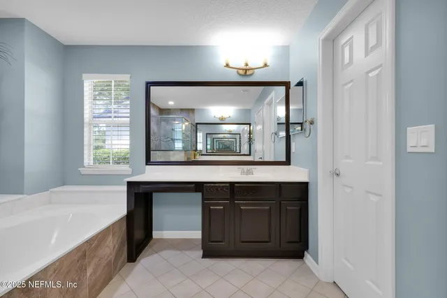 an aerial view of house with yard swimming pool and outdoor seating