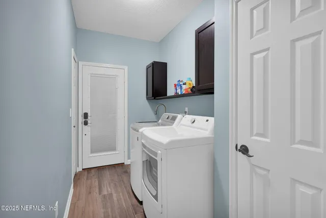 a picture of a bathroom with a shower