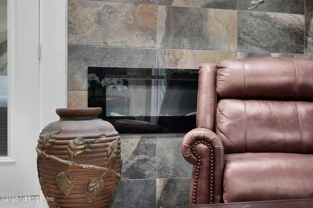 a bathroom with a sink vanity mirror and toilet
