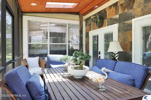 a view of an entryway with a glass door