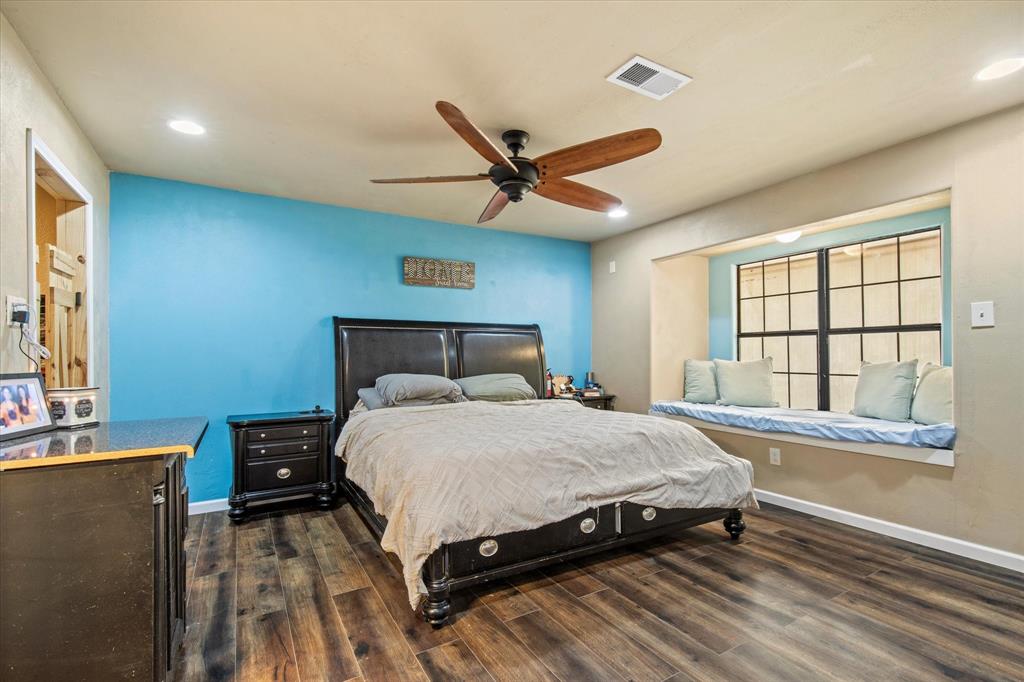 15870 County Road 339 Terrell, TX 75161 - Photo 12 of 26 a bedroom with a bed and a large window