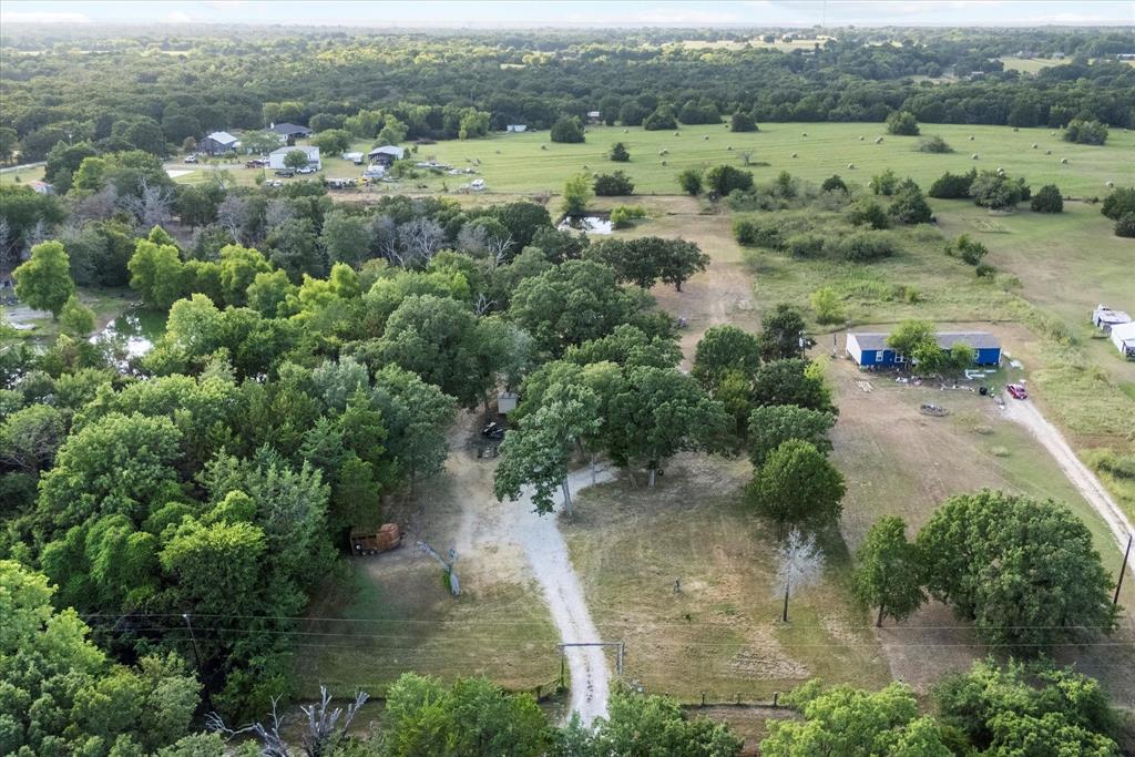 15870 County Road 339 Terrell, TX 75161 - Photo 22 of 26 an aerial view of residential house with outdoor space and trees all around