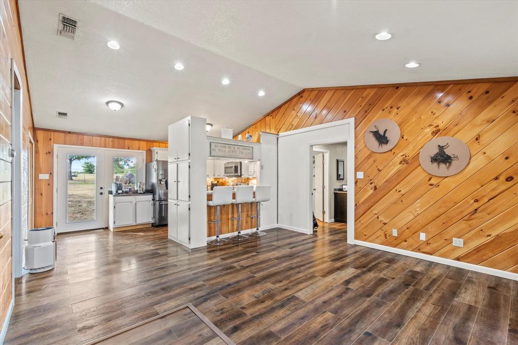 15870 County Road 339 Terrell, TX 75161 - Photo 5 of 26 a view of a big room with wooden floor and windows