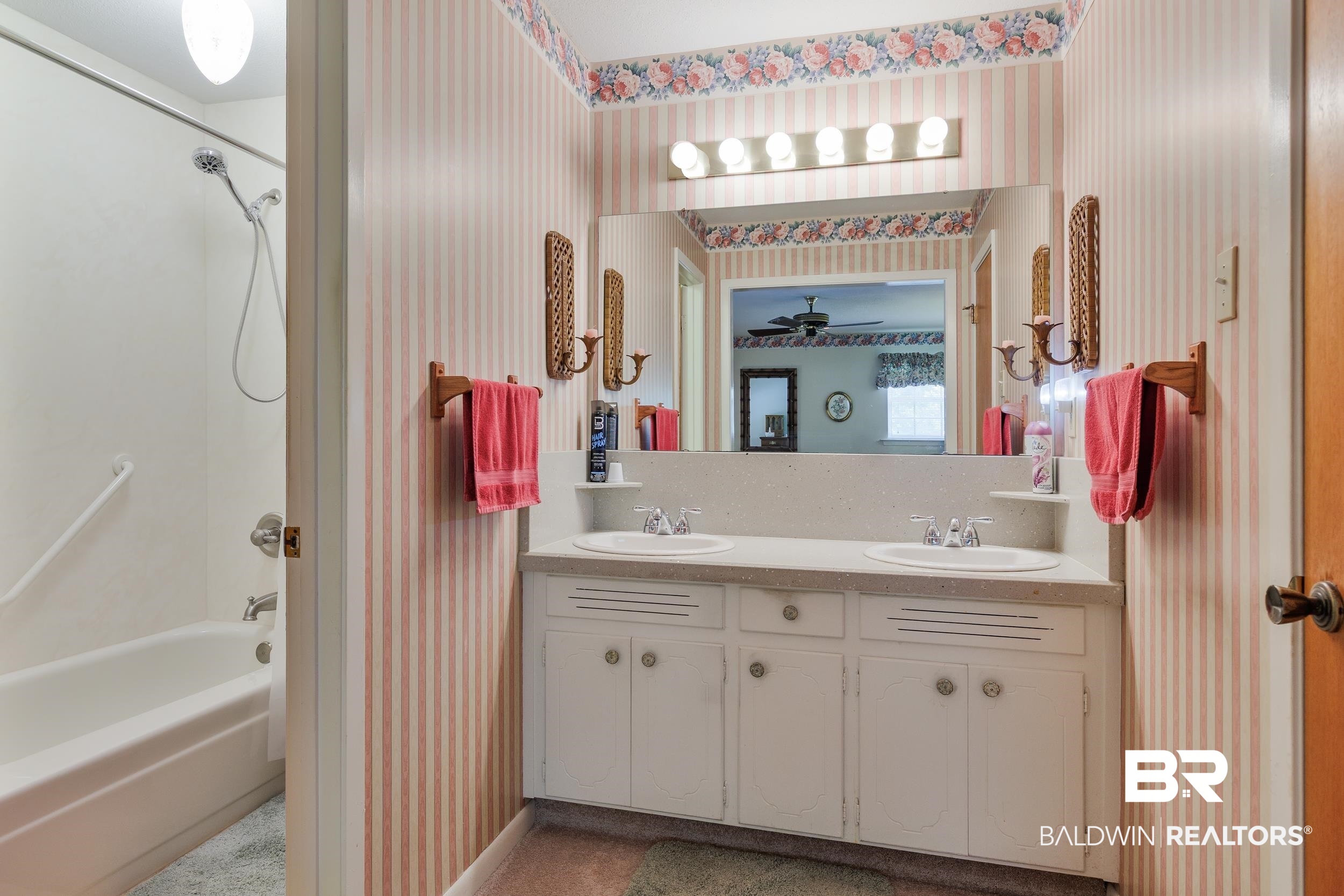 1367 Spring Valley Court Mobile, AL 36693 - Photo 2 of 29 Bathroom featuring a dual vanity with white cabinetry, integrated sinks, and a large wall-mounted mirror