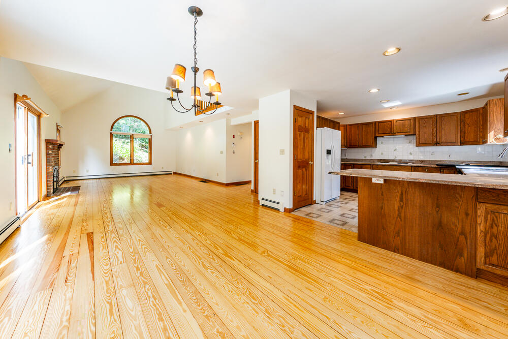 34 Ridgewood Road Orleans, MA 02653 - Photo 12 of 41 a view of a kitchen with wooden floor and a sink