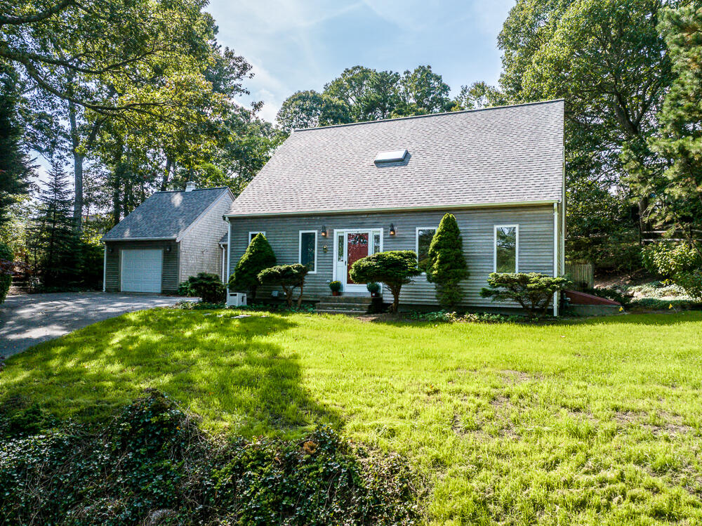 34 Ridgewood Road Orleans, MA 02653 - Photo 2 of 41 a view of house with outdoor space