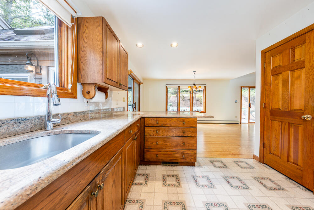 34 Ridgewood Road Orleans, MA 02653 - Photo 21 of 41 a view of a kitchen with a sink and cabinets