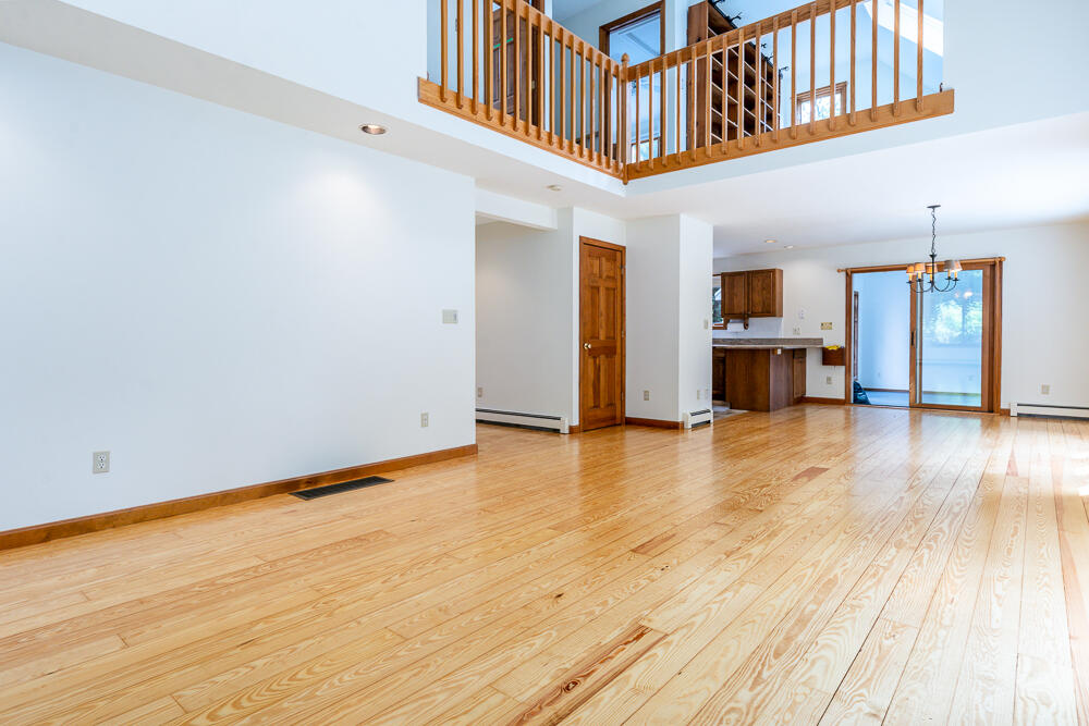 34 Ridgewood Road Orleans, MA 02653 - Photo 27 of 41 a view of a livingroom with a kitchen