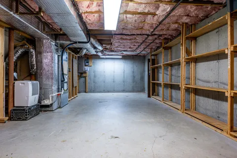 a view of an empty room with stairs