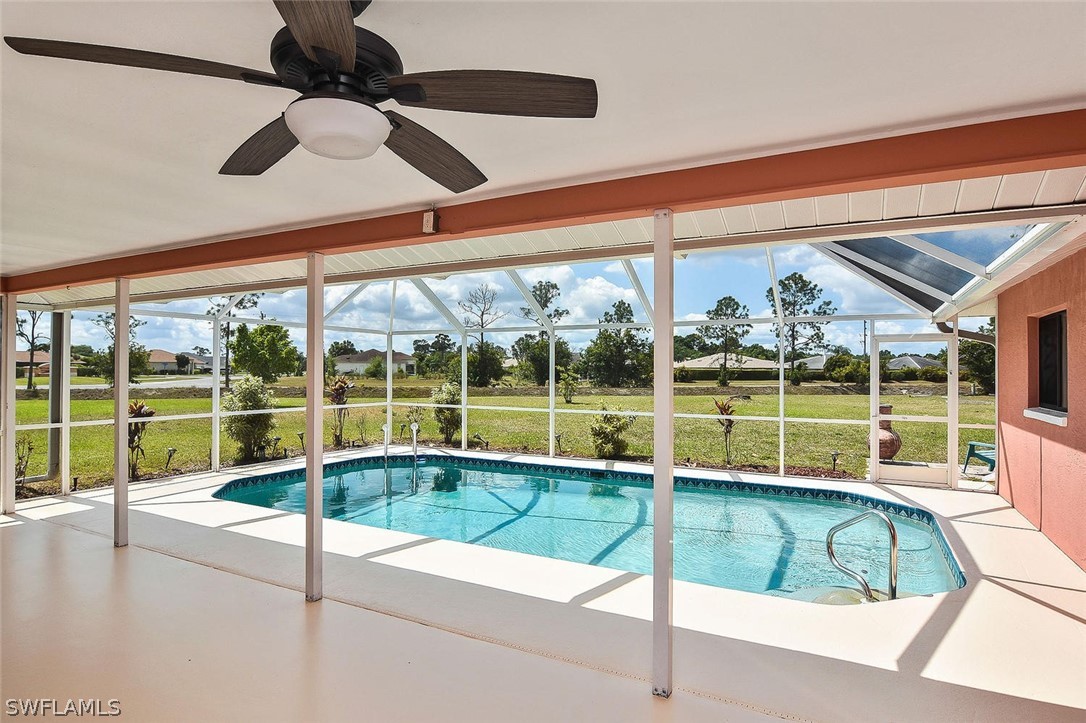 230 Danby Road Lehigh Acres, FL 33936 - Photo 19 of 35 a view of swimming pool