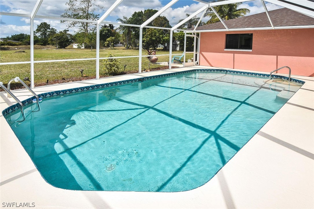 230 Danby Road Lehigh Acres, FL 33936 - Photo 2 of 35 a view of a backyard