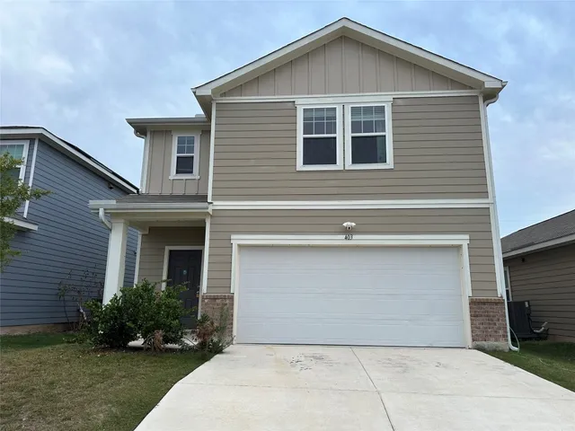 a front view of house with yard