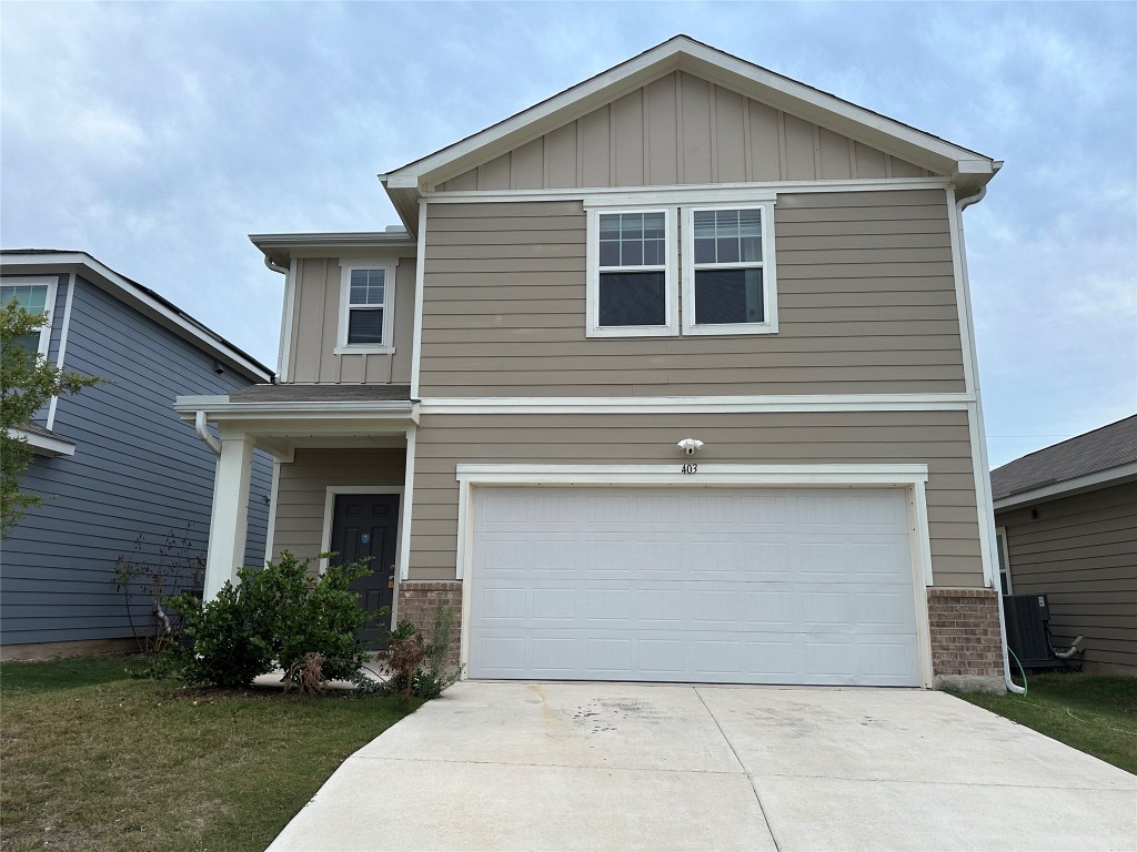 a front view of house with yard