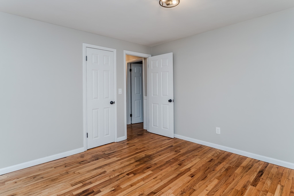 33 Grimard Street Ludlow, MA 01056 - Photo 13 of 27 a view of a room with wooden floor