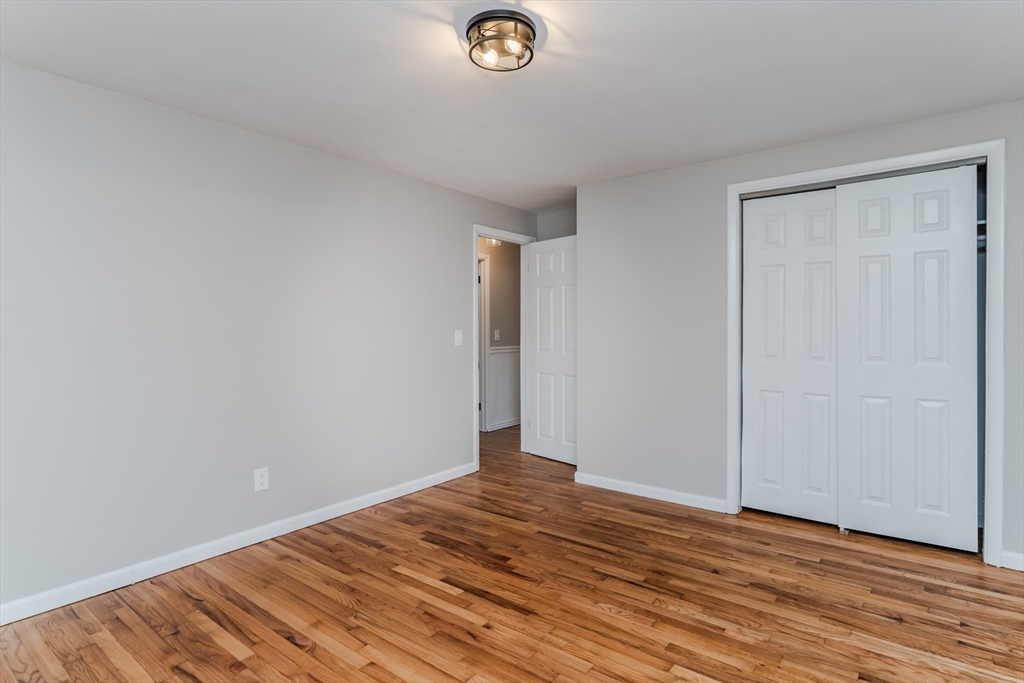 33 Grimard Street Ludlow, MA 01056 - Photo 15 of 27 a view of empty room with wooden floor