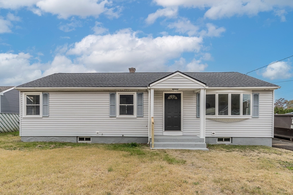 33 Grimard Street Ludlow, MA 01056 - Photo 21 of 27 a view of a house with a wooden fence