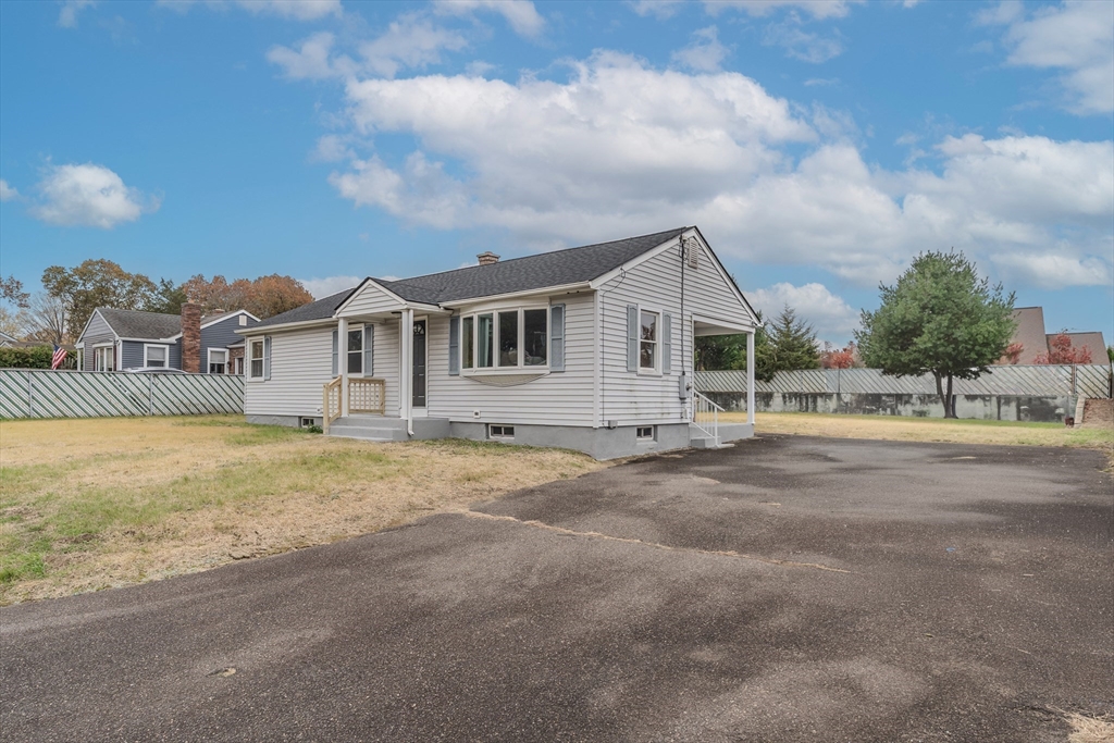 33 Grimard Street Ludlow, MA 01056 - Photo 22 of 27 a view of a house with a yard