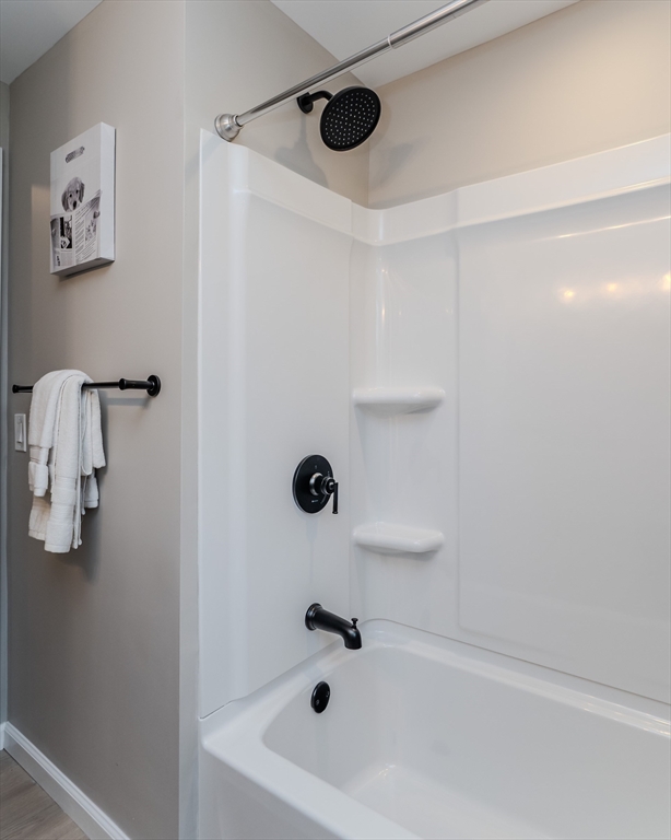 33 Grimard Street Ludlow, MA 01056 - Photo 10 of 27 a bathroom with a tub