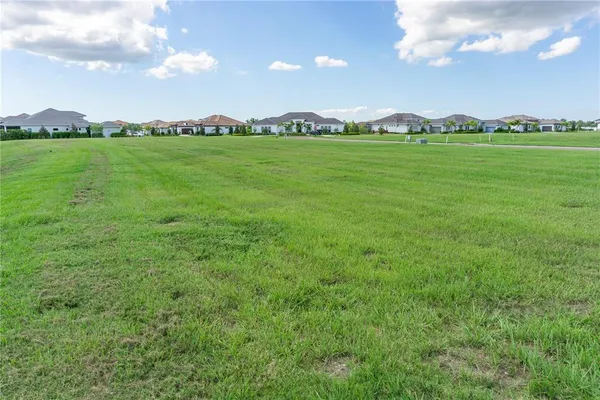 a view of an ocean and a mountain
