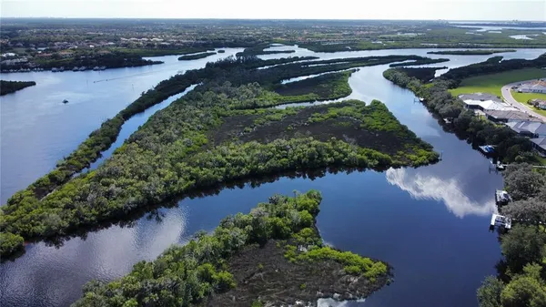 an aerial view of lake residential house with outdoor space