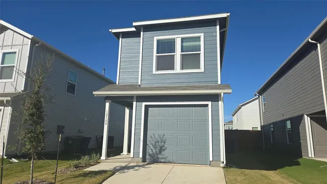 a front view of a house with glass windows