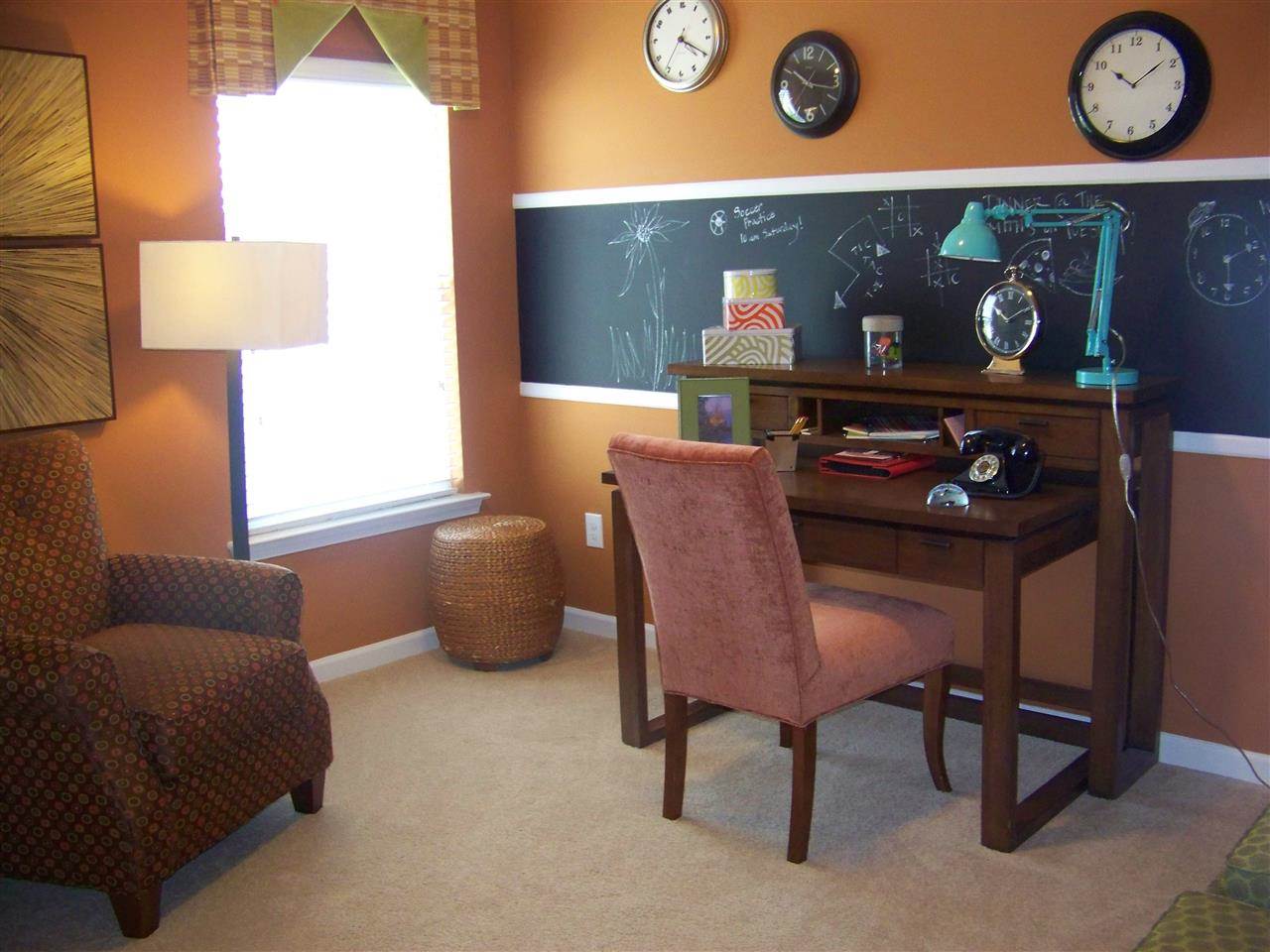 5301 Stowecroft Lane Raleigh, NC 27616 - Photo 15 of 25 a dining room with furniture and a window