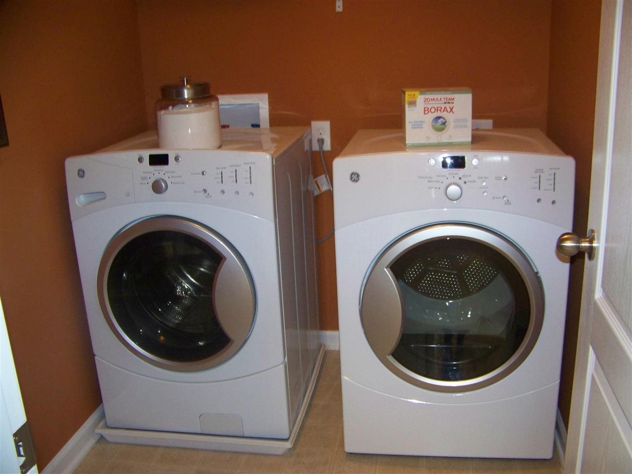 5301 Stowecroft Lane Raleigh, NC 27616 - Photo 19 of 25 a utility room with dryer and washer