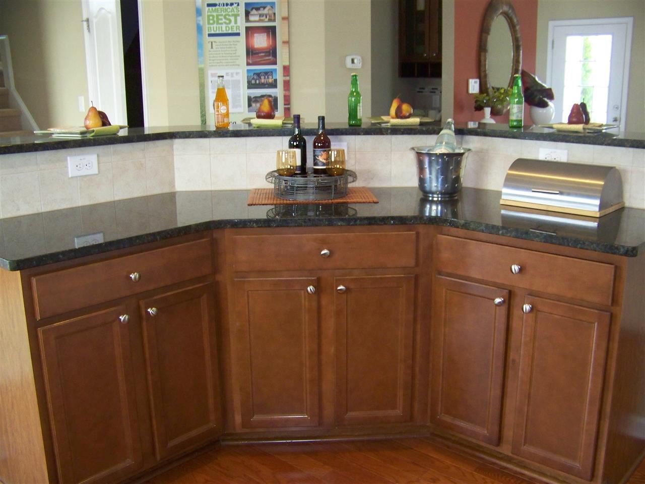 5301 Stowecroft Lane Raleigh, NC 27616 - Photo 6 of 25 a kitchen with sink and large mirror