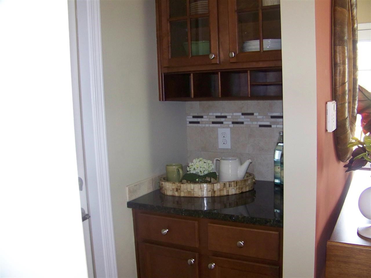 5301 Stowecroft Lane Raleigh, NC 27616 - Photo 8 of 25 a room with a sink and a mirror