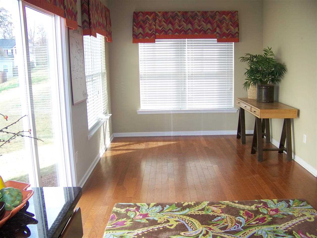 5301 Stowecroft Lane Raleigh, NC 27616 - Photo 10 of 25 a view of a room with window and wooden floor