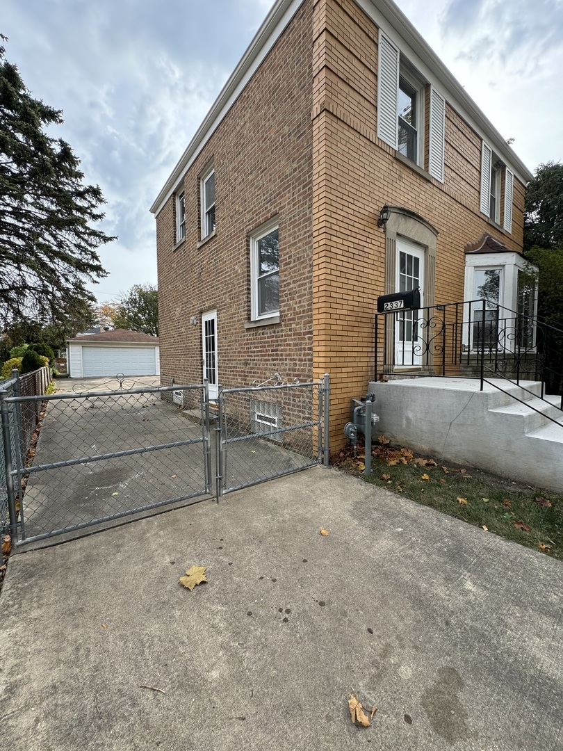 2337 South 3rd Avenue North Riverside, IL 60546 - Photo 5 of 17 a view of a house with a street